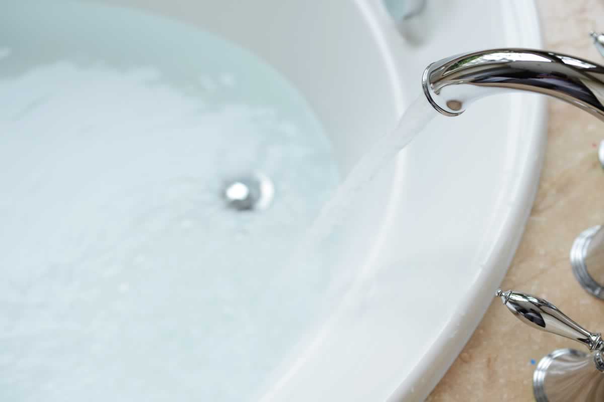 For a greater saving, use the water left in the tub to do the laundry.