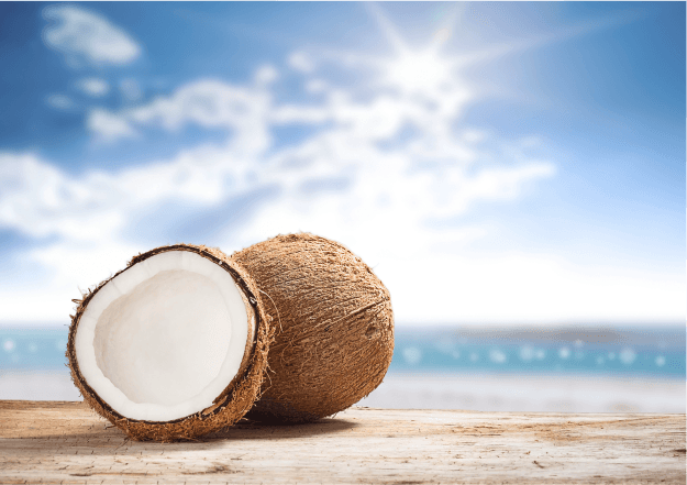 Coconut oil, rich in lauric acid, protects your hair from losing its proteins.