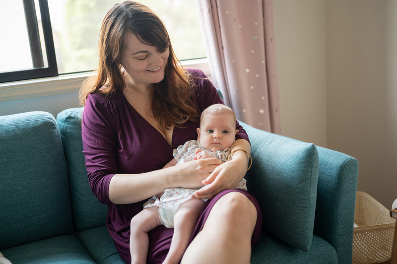 Marion poses with her baby, while talking about how she uses the arau.baby products.