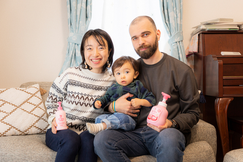 Takako, Todor, and little Toma posing with some arau.baby products.